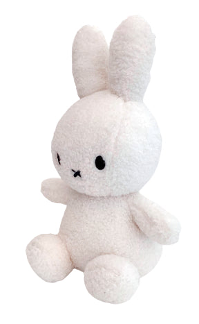 Side view of cream teddy Miffy the rabbit