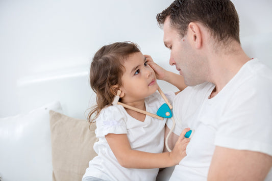 Girl role playing with medical set