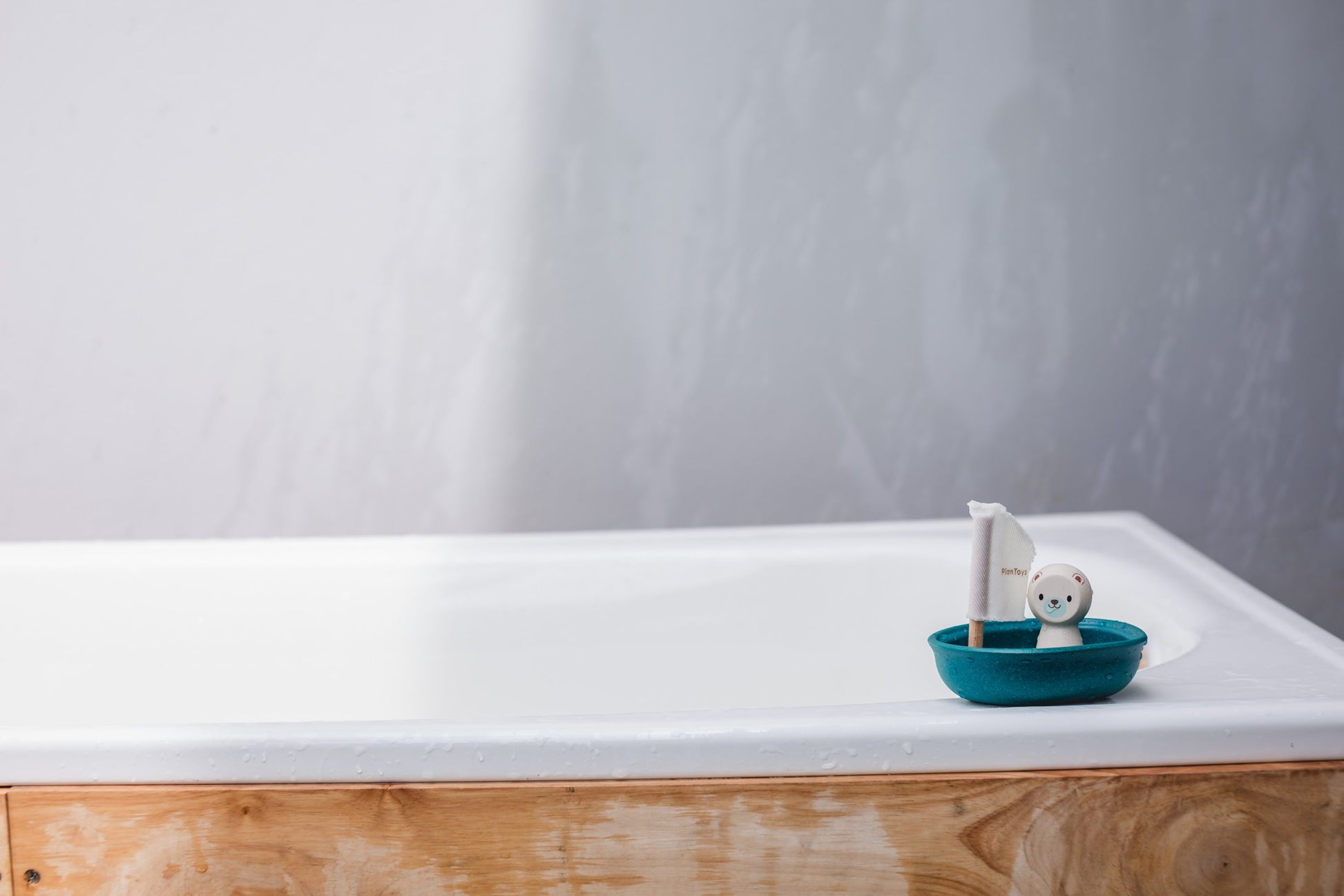 Polar Bear Sailing Boat on the side of a bath