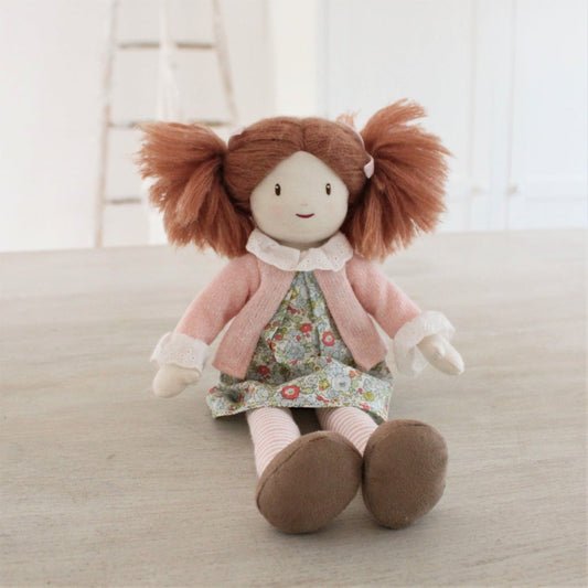 Rag doll sitting down