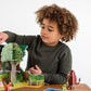 Boy playing with Gruffalo pop out play press set