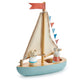 Front view of wooden sail away boat with bunny and bear figurines