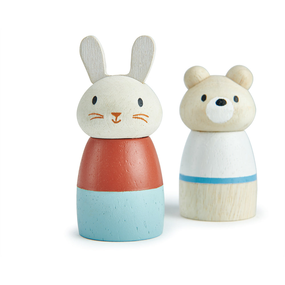 Front view of wooden bunny and bear figurines