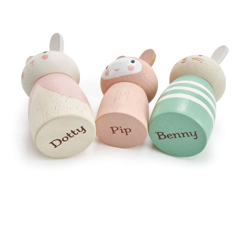 Bottom view of wooden bunny family revealing their names