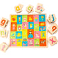 Wooden alphabet puzzle with all the pieces sitting on the side revealing pictures