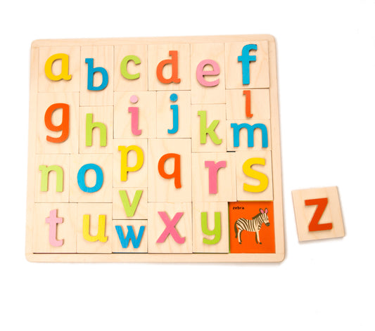 Wooden alphabet puzzle with the missing letter Z revealing a Zebra
